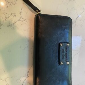 Kate Spade Black Leather Wallet with Gold Accents and purple interior